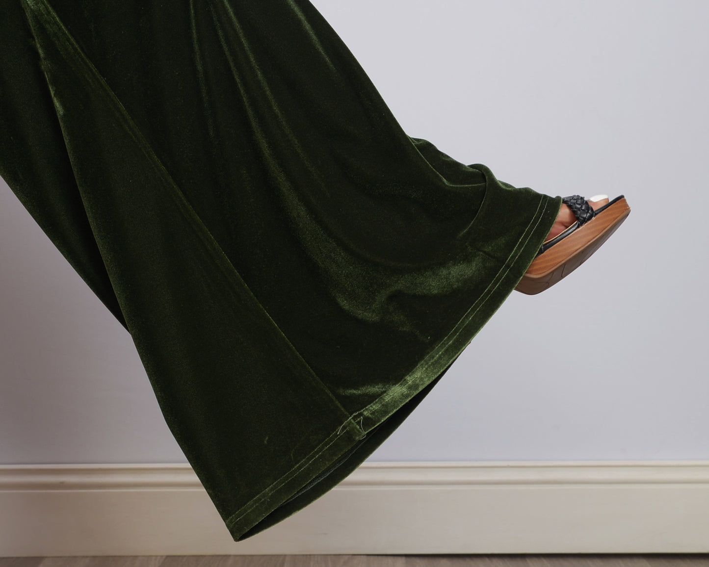 Leg opening view of green velvet pants made exclusively for tall women