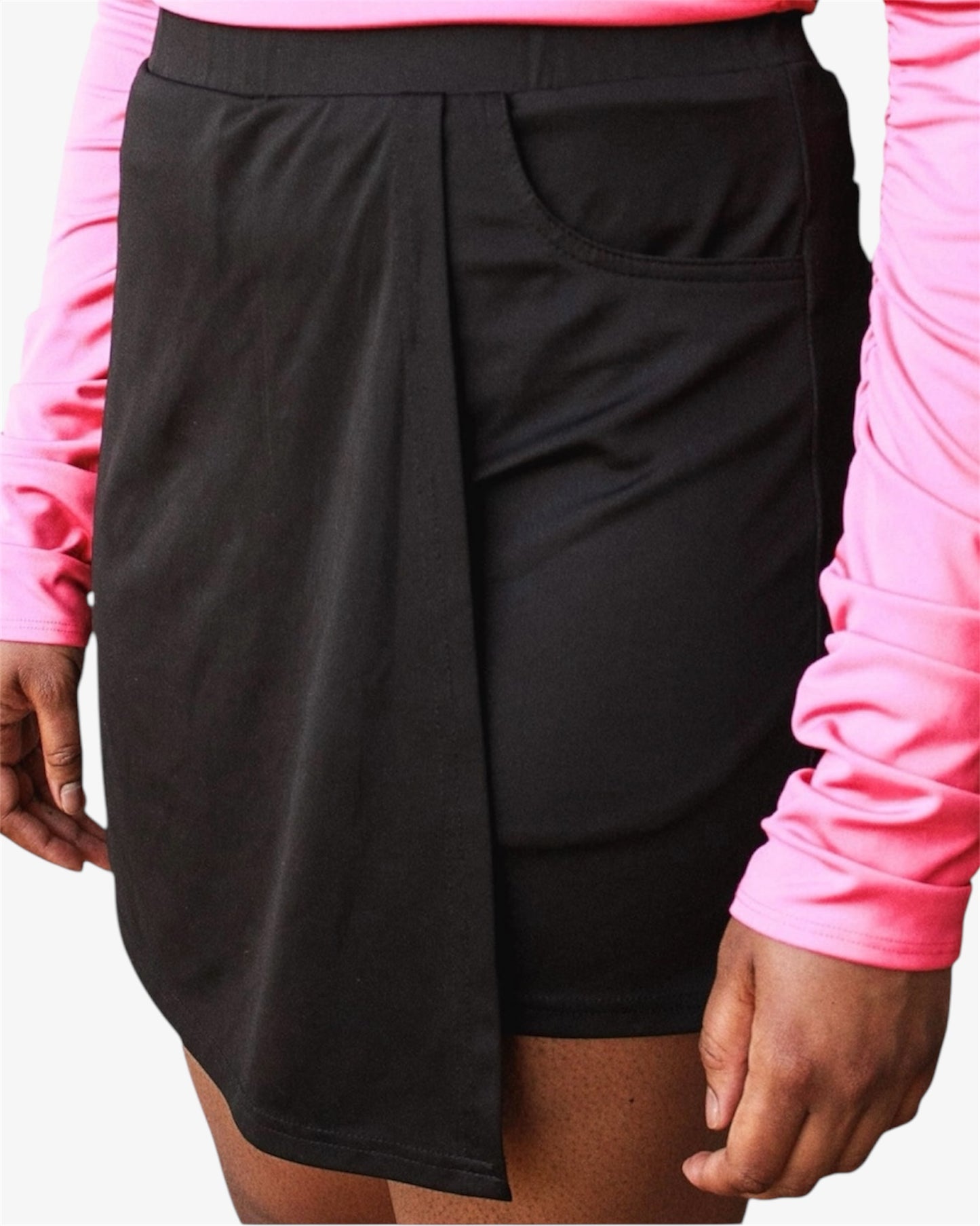 Side view of tall women’s mini skort – classic black with pocket detail