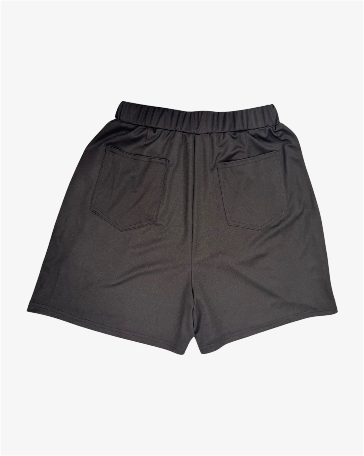 Back view of tall girl skort with high rise and angled hem