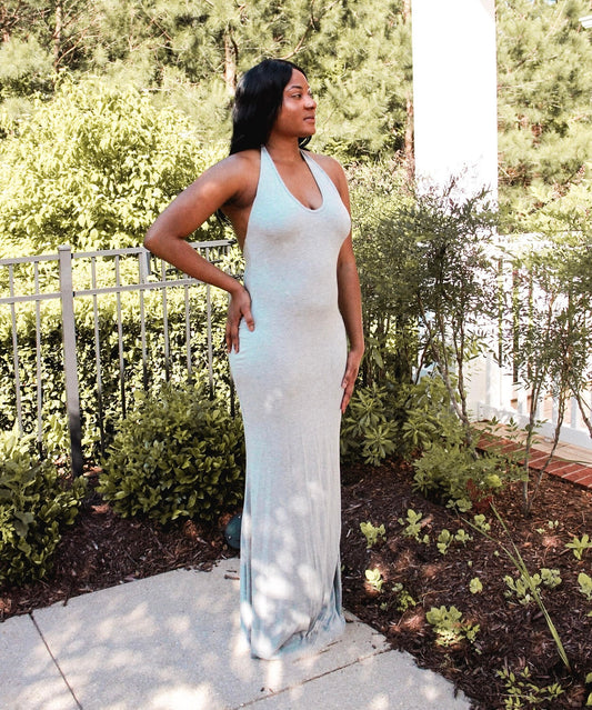Tall woman wearing floor-length maxi dress