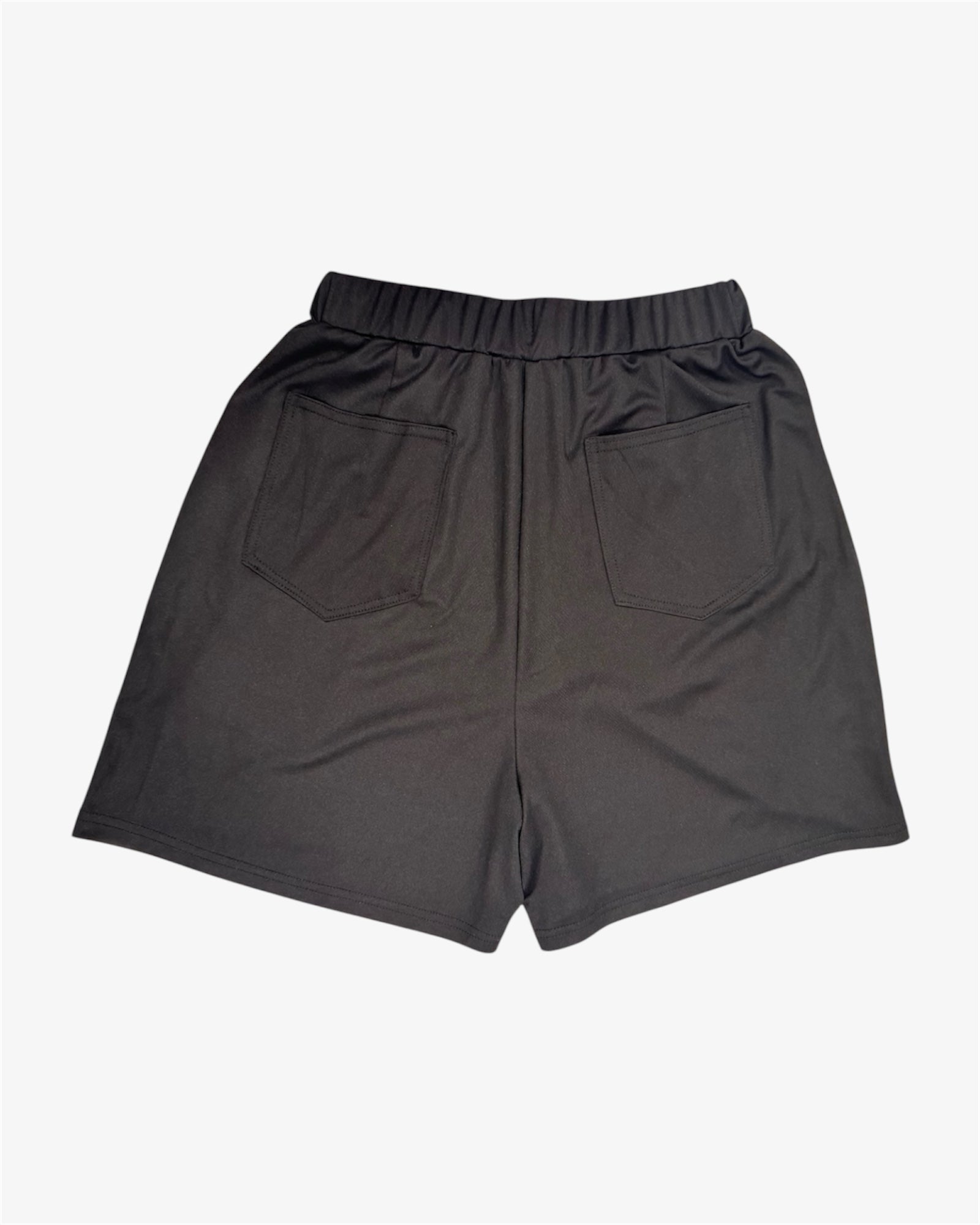 Back view of tall girl skort with high rise and angled hem